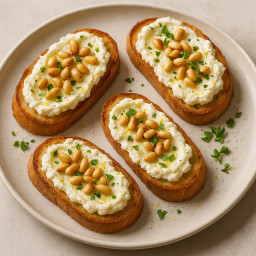 Appetizer: Italy – Crostini con ricotta al limone e pinoli tostati