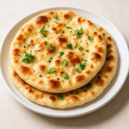 Side Dish: India – North India – बटर नान ➤ Butter Naan (Buttered leavened flatbread)